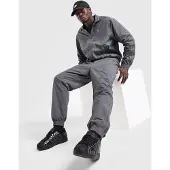 Adidas Originals Pantalon de survêtement Firebird Woven - Gris, Gris