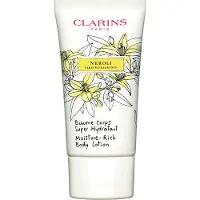 Clarins Fleurs blanches - Lotion pour le corps au néroli (Crème pour le corps, 75 ml)