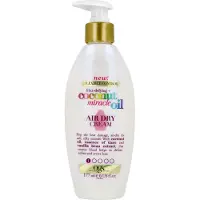 OGX Miracle de la noix de coco Oil Crème lissante contre les cheveux crépus 177 ml