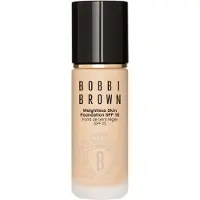 Bobbi Brown Weightless Skin Foundation SPF 15 fond de teint longue tenue pour un effet naturel teinte Warm Ivory 30 ml