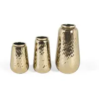 GINER Y COLOMER Ensemble de trois vases décoratifs en métal doré