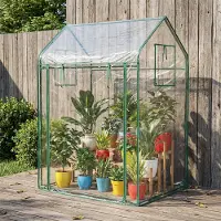 Costway Petite serre à tomates 129 x 80 x 173 cm, serre portable en plastique avec filet pare-soleil noir, film PVC, porte, fenêtre et piquets