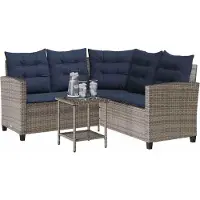 vidaXL Canapé de jardin en L avec table et coussins Gris Poly rotin