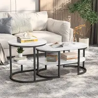 ProximaX Tables basses gigognes ovales et rondes effet marbre blanc avec structure noire，créant un design moderne et élégant