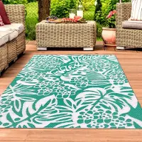 Teppichhome24 Tapis d'extérieur aux accents tropicaux, couleur pétrole - Dimensions : 150 x 220 cm