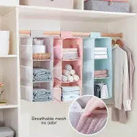Markenlos Armoire suspendue à 3 compartiments, 9 sacs en filet pour la garde-robe familiale, 30 x 22,5 x 60 cm, rose, pliable et s'adapte à n'importe quel mur