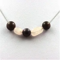 Bijoux Pierres et Minéraux. Collier perles Rubis de Mogok, Birmanie, Myanmar 8 mm + Quartz rose du Chaine en acier inoxydable.