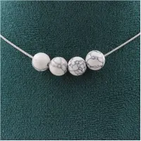 Bijoux Pierres et Minéraux. Collier 4 perles Howlite 8 mm. Chaine en acier inoxydable Collier femmes, hommes. Taille personnalisable.