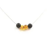 Bijoux Pierres et Minéraux. Collier 4 perles Ambre véritable de la mer Baltique + Onyx noir mat 8 Chaine en acier inoxydable.