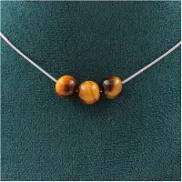 Bijoux Pierres et Minéraux. Collier 3 perles Oeil de Tigre 8 mm. Chaine en acier inoxydable Collier femmes, hommes. Taille personnalisable.