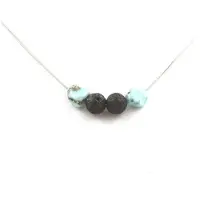 Bijoux Pierres et Minéraux. Collier Larimar de République dominicaine + Perles Lave 8 mm Chaine en acier inoxydable.
