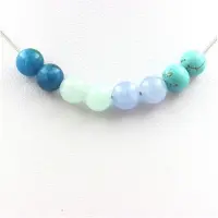 Bijoux Pierres et Minéraux. Collier perles Angélite + Aigue-marine + Turquoise + Apatite 8 mm Chaine en acier inoxydable.