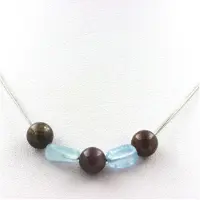Bijoux Pierres et Minéraux. Collier perles Rubis de Mogok, Birmanie, Myanmar 8 mm + Aigue-Marine Chaine en acier inoxydable.