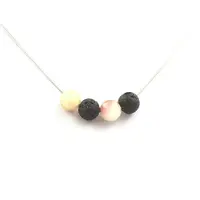 Bijoux Pierres et Minéraux. Collier Perles Tourmaline melon d'eau + Lave 8 mm Chaine en acier inoxydable.