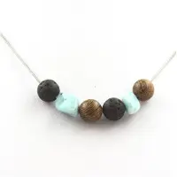 Bijoux Pierres et Minéraux. Collier perles bois + Lave + Larimar de République Dominicaine 8 mm Chaine en acier inoxydable.