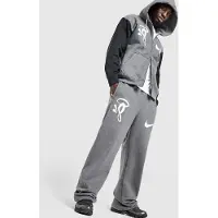 Nike Pantalon de jogging Solo Swoosh Fleece x Syna - Gris, Gris