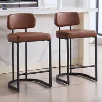 Sonstiges Ensemble de 2 tabourets de bar avec repose-pieds et dossier, revêtus de similicuir marron, hauteur d'assise de 66 cm