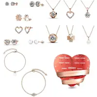 Merkloos Calendrier de l'Avent contenant 14 bijoux en cuivre doré