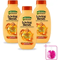 Garnier 3 bouteilles de shampooing Loving Blends, gamme "Honoring Goud", pour cheveux abîmés et fragilisés, 300 ml. Pack économique - 3 pièces